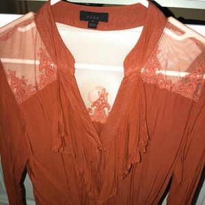 Laced blouse with sleeve